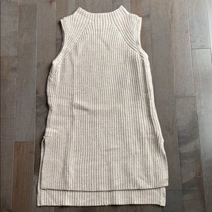 Sleeveless merino wool sweater, thigh length